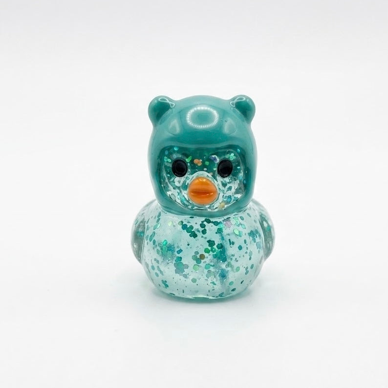 Mini figura de Patoso de resina de 1,5 cm que brilla en la oscuridad en vista adicional