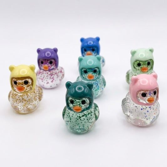 Mini Figuras de Resina "Glow-In-The-Dark" – Colección Patoso 1.5 cm – Proyecto Ensamble