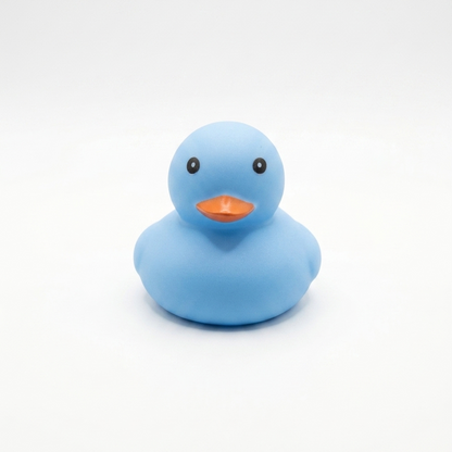 Pato de hule azul minimalista de 5cm, diseño limpio Proyecto Ensamble.