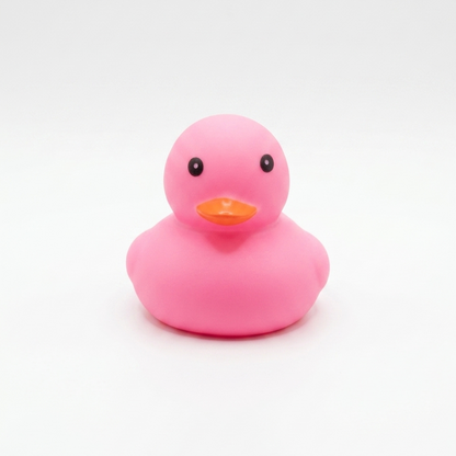 Pato de hule rosado minimalista de 5cm, diseño limpio Proyecto Ensamble.