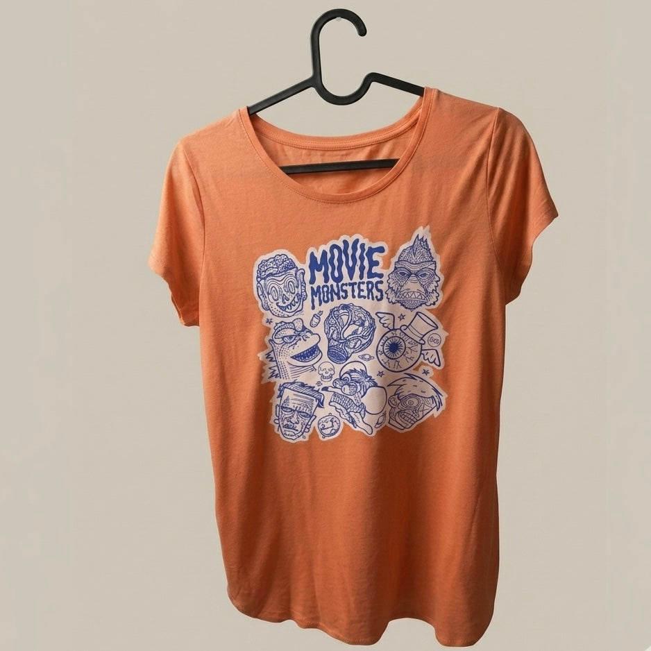 Polera salmón con bolsillo ilustración Movie Monsters Pocket Edición Gráfica por Proyecto Ensamble 2