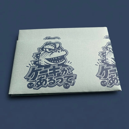 Tarjetero de papel termolaminado impermeable ilustración Godzilla Torta por Don Libedlulo para Proyecto Ensamble 4