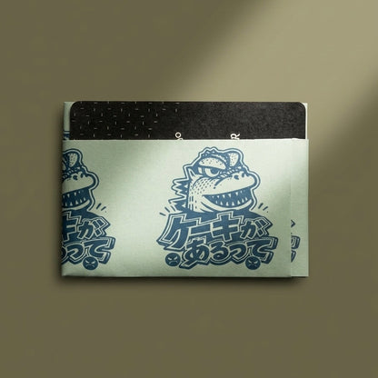 Tarjetero de papel termolaminado impermeable ilustración Godzilla Torta por Don Libedlulo para Proyecto Ensamble 6